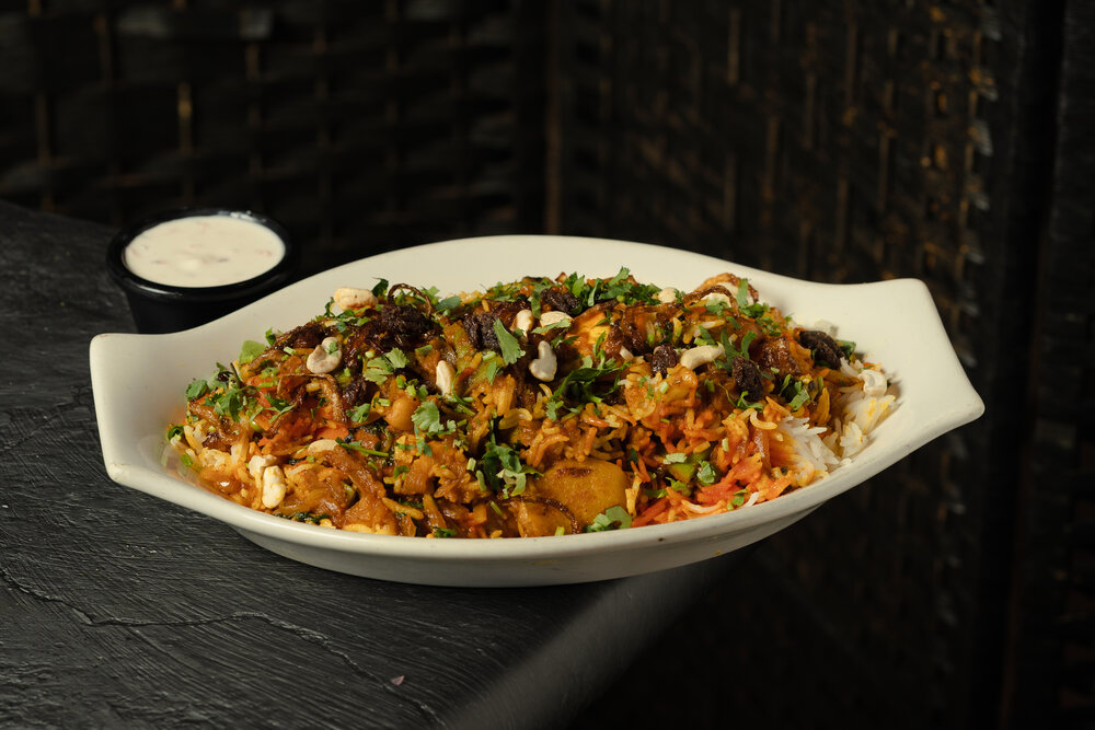 Chicken biryani with basmati rice and raita